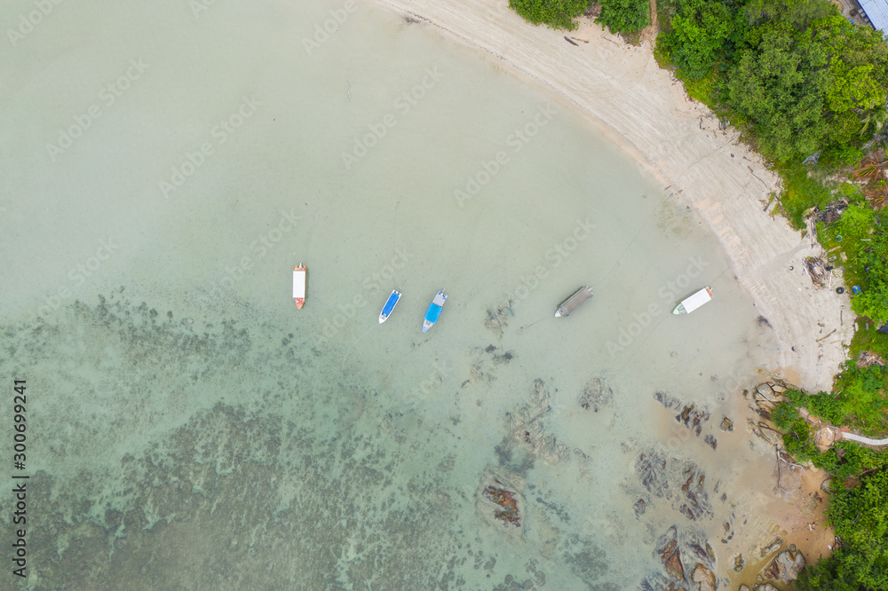 Aerial drone image of Beautiful white sandy beach with turquoise sea water beach at Kudat, Sabah, Borneo