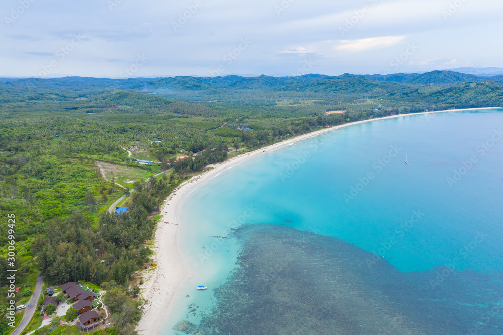 Aerial drone image of Beautiful white sandy beach with turquoise sea water beach at Kudat, Sabah, Borneo