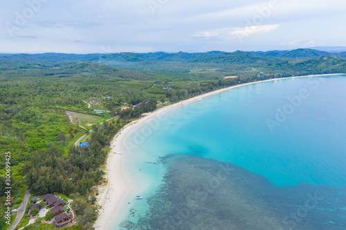 Aerial drone image of Beautiful white sandy beach with turquoise sea water beach at Kudat, Sabah, Borneo © alenthien