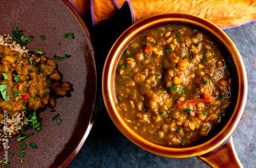 Overhead view of lentil dal with quinoa in sauce pan photo