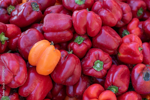 Delicious and fresh red Capsicums or red pepper vegetables on a fruit market