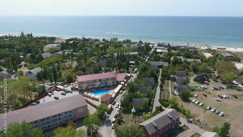 Aerial shot of a gorgeous wading pool at a hotel on a seashore in summer Aerial shot of a gorgeous wading pool at a hotel on a seashore in summer