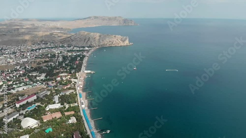 The view from the heights of the resort town of Sudak located on the Crimean peninsula. Russia. A popular destination for vacations and holidays on the Black Sea.