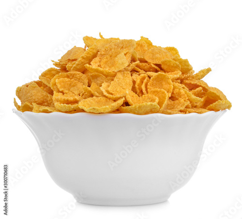 tasty cornflakes in bowl  isolated on white
