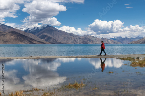 Traveler man enjoy Pangong Lake (Pangong Tso) Merak, Leh, Jammu and Kashmir ,India.