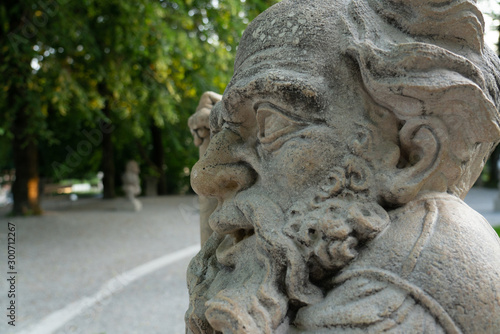 Profile of one of the statues of the Dwarf Garden, near Mirabell Garden in Salzburg