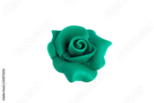 Decorative green rose isolated on white background top view
