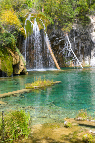 Waterfalls and crystal clear water at Hanging Lake park in Colorado  USA