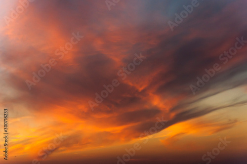Beautiful sunset sky with amazing colorful clouds. © Bea