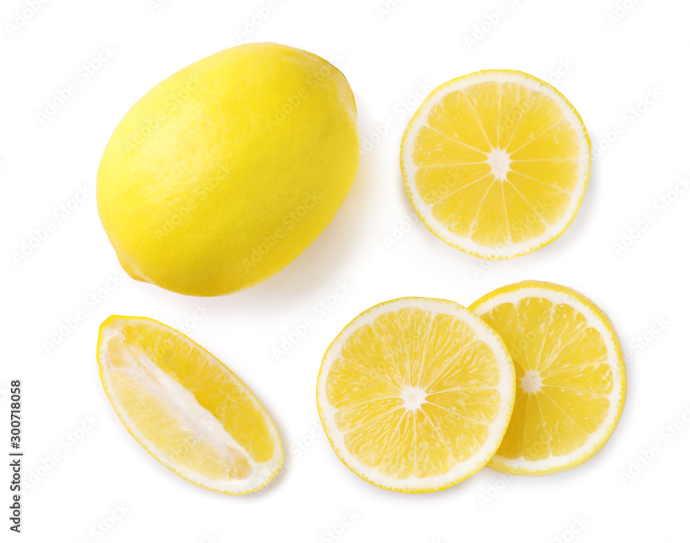 Sliced and whole fresh lemons on white background, top view