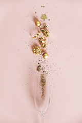 Flat lay of Celebration. Champagne glass and Christmas decoration