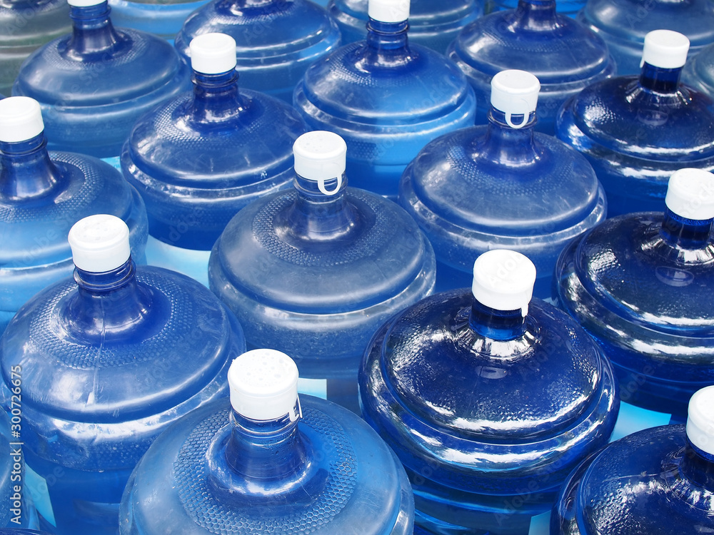 Water bottled bottle plastic pack drinking water hi-res stock