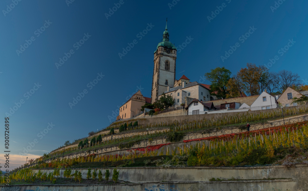 Church castle and old houses in old town Melnik in central Bohemia