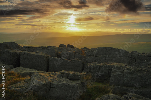 Stunning sunset from the rocky outcrop at the top of Great Whernside overlooking Wharfedale, Yorkshire Dales, UK © Phil
