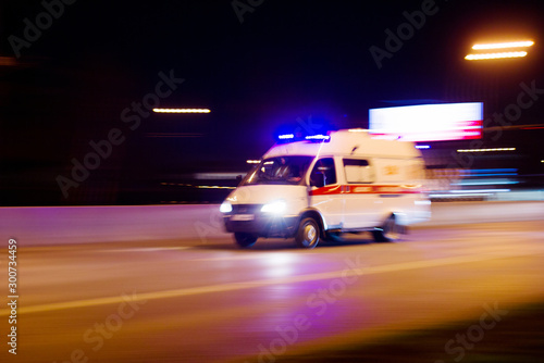 Ambulance is rushing to a call to a sick call