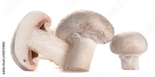 Fresh half champignon mushrooms, isolated on white background