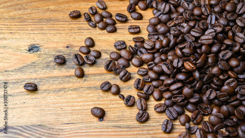 Coffee beans on wooden background