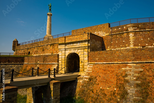 BELGRAD, SERBIA: Unidentified people at Statue of Victory in Belgrade. Erected on 1928 to commemorate the Kingdom of Serbia war victories over Ottoman Empire photo