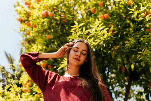 burning southerner on an orange tree background