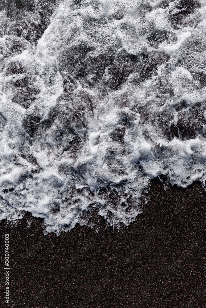 White waves on the shore. Sea and beach. Background White waves on the shore. Sea and beach. Background
