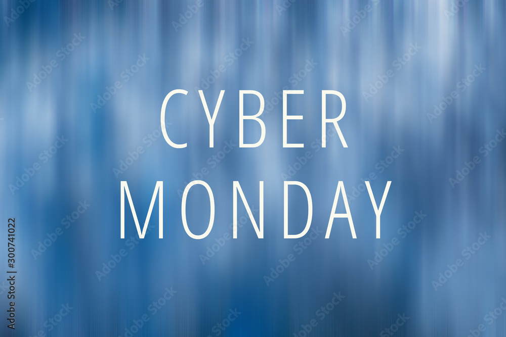 Cyber Monday lettering on blue blurred background.