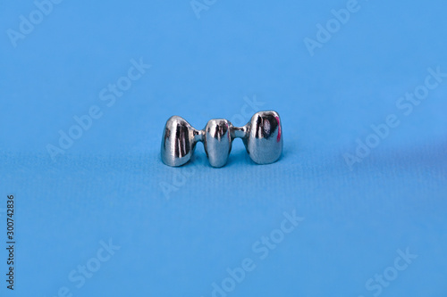 Картината върху платно Dental silver metal tooth crowns