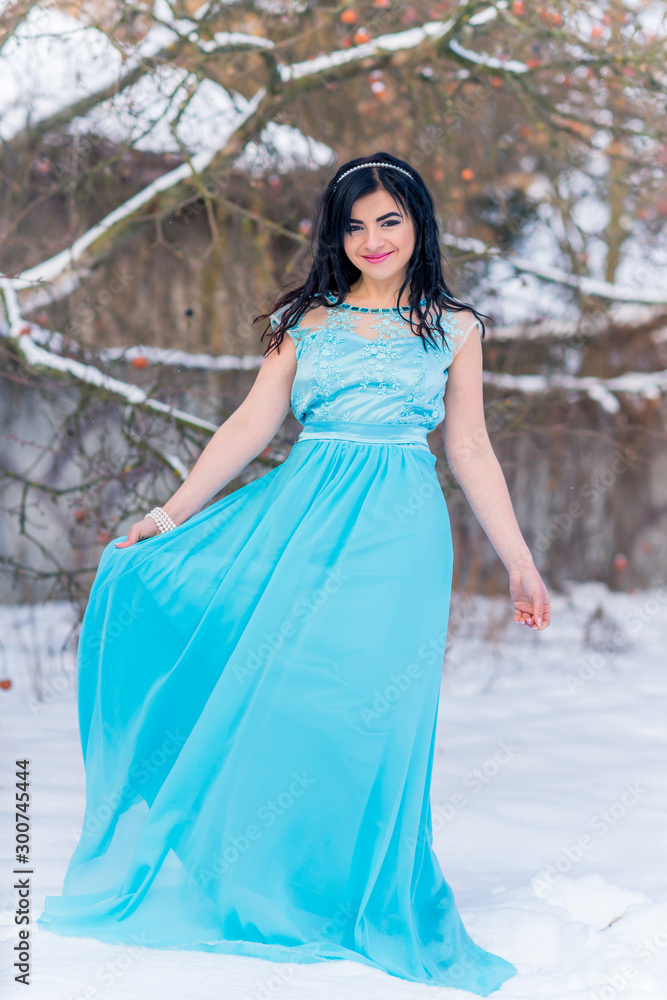 Christmas or New Year Holidays, magical atmosphere and pretty woman at snowy day. Inspiration and winter idea Christmas or New Year Holidays, magical atmosphere and pretty woman at snowy day. Inspiration and winter idea