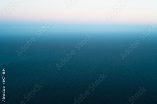 Idyllic colorful seascape background while sunset