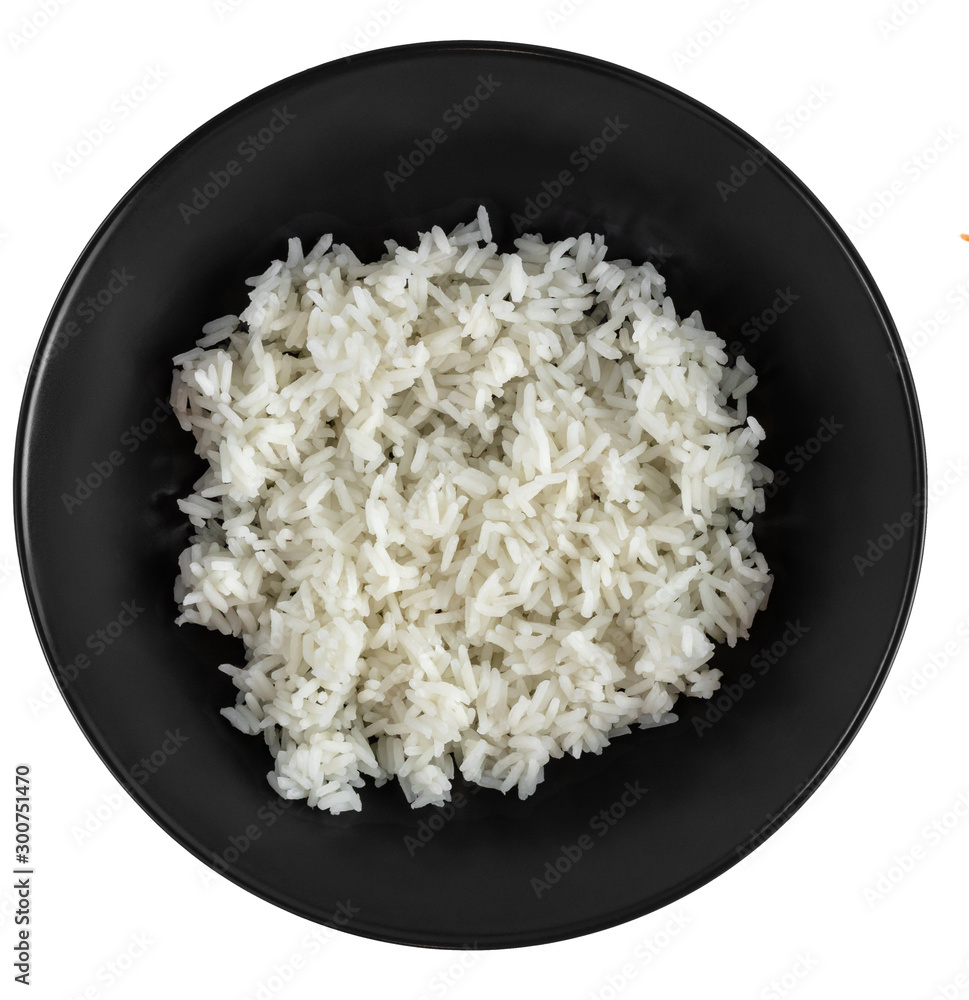 White rice in black matte plate isolated on a white background, top view White rice in black matte plate isolated on a white background, top view