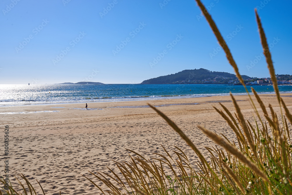 Empty beach with low tide in Playa America near Vigo, Galicia Empty beach with low tide in Playa America near Vigo, Galicia