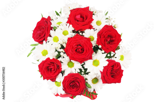 Bouquet of red and white spring flowers on a white background . top view