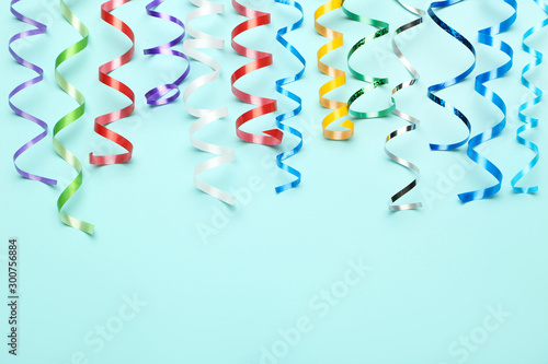 Colorful ribbons on blue background
