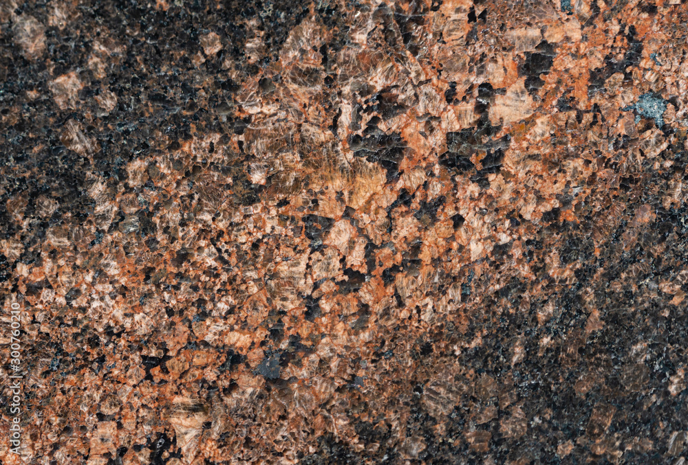 Polished granite as background to any disain. Close up of red marbled granite texture Polished granite as background to any disain. Close up of red marbled granite texture