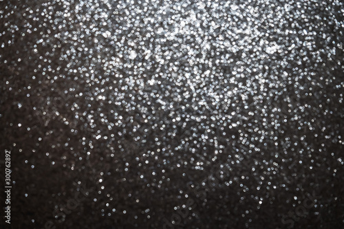 Silver and gray glitter Background. Glitter and Christmas abstract background. Defocused