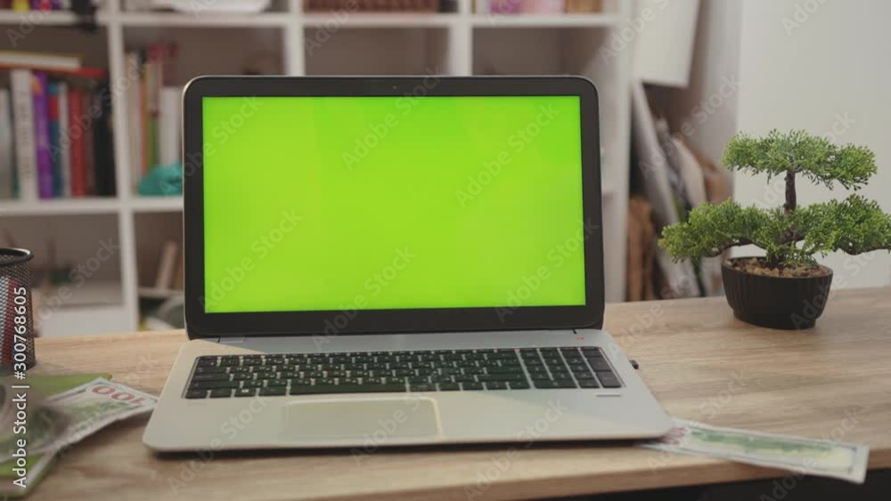 Young hands man use laptop computer with green screen chroma key display internet business office technology work desk connection keyboard pc device slow motion Young hands man use laptop computer with green screen chroma key display internet business office technology work desk connection keyboard pc device slow motion