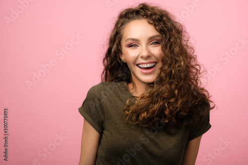 Pretty girl isolated on pink background