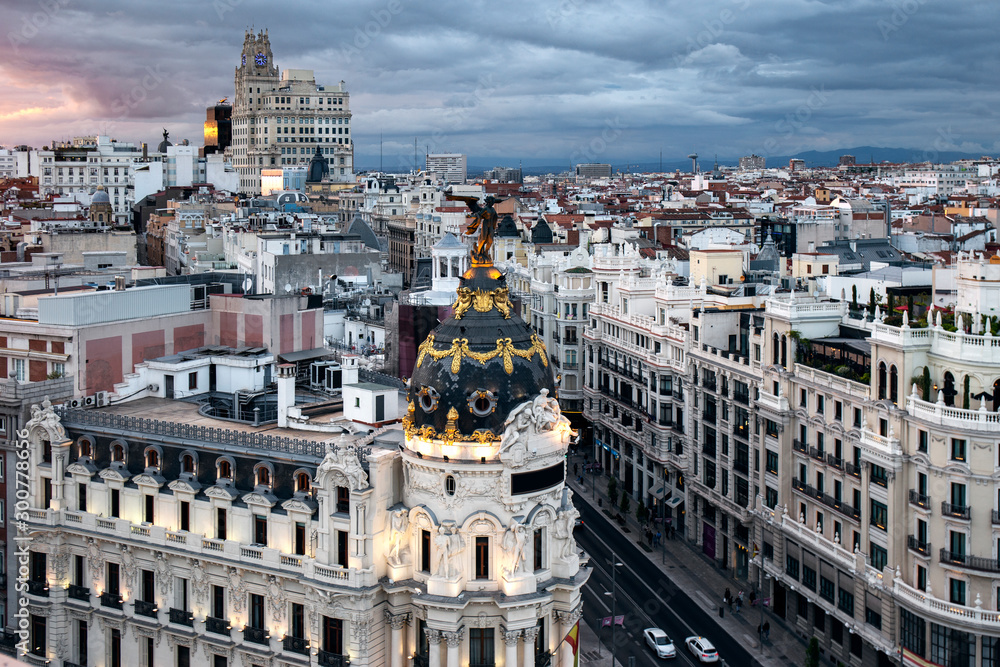 Aerial cityscape of Madrid with the famous Metropolis building at sunset in Madrid, Spain
