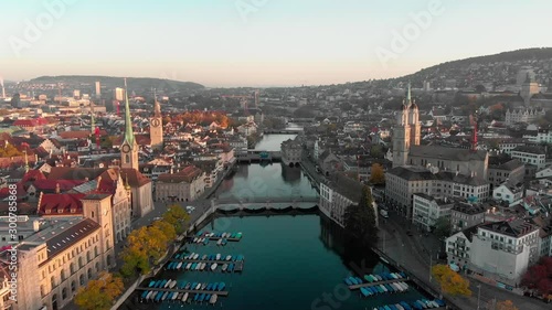 Aerial cityscape flythrough video of Zurich and River Limmat at Sunrise, Switzerland photo