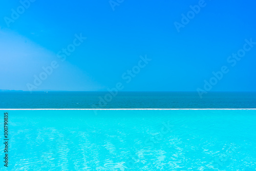 Fototapeta Naklejka Na Ścianę i Meble -  Beautiful landscape of sea ocean with outdoor swimming pool on white cloud