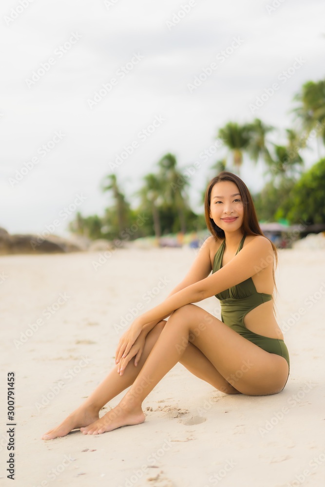 Portrait beautiful asian women happy smile relax on the tropical beach sea ocean Portrait beautiful asian women happy smile relax on the tropical beach sea ocean
