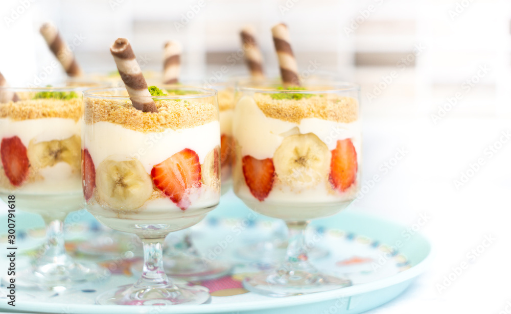 magnolia dessert, strawberries and banana on tray magnolia dessert, strawberries and banana on tray