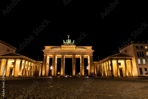The majestic Brandenburg Gate in Berlin at night, viewed from Pariser Platz on the East Side