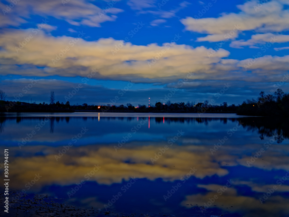 reflective lake at sunset