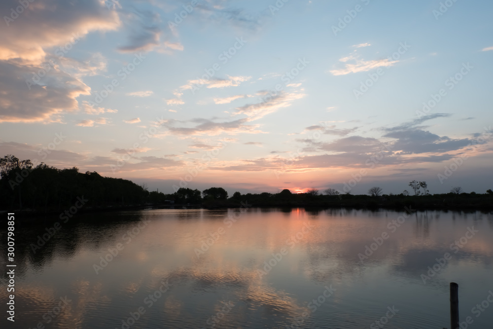 Beautiful sunsets near the lake, mangroves become silhouettes because it involves the sun's rays
