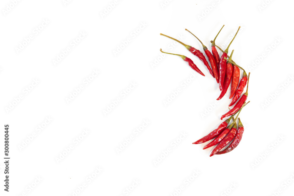 Bright red Thai bird chiles isolate on a white background with copy space Bright red Thai bird chiles isolate on a white background with copy space