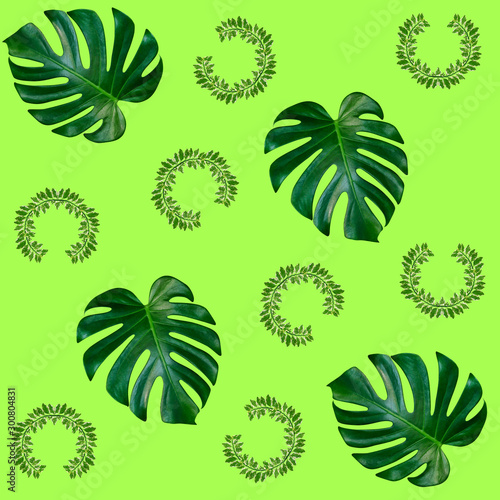 Green palm leaves pattern for nature concept,tropical leaf on green background