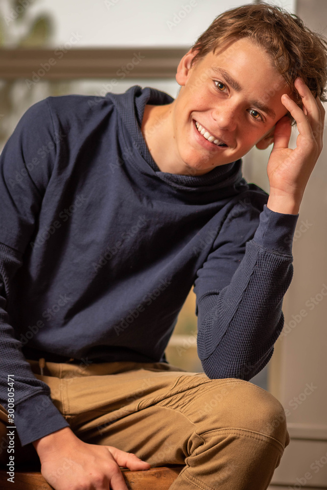 Close up portrait of a young man, smiling, relaxed. Close up portrait of a young man, smiling, relaxed.