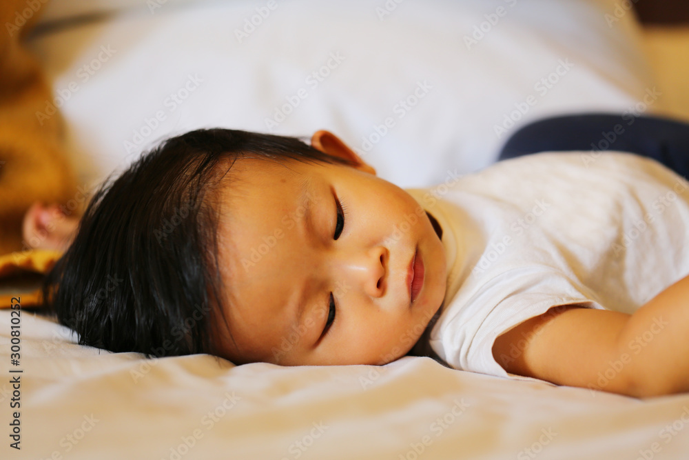 Young boy sleeping in bed. Asian boy sleepy action. Stock Photo | Adobe  Stock
