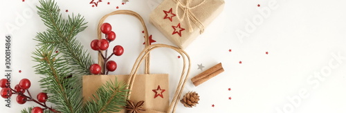 Christmas background banner with fir twigs, gift box,  shopping bags, Xmas or...