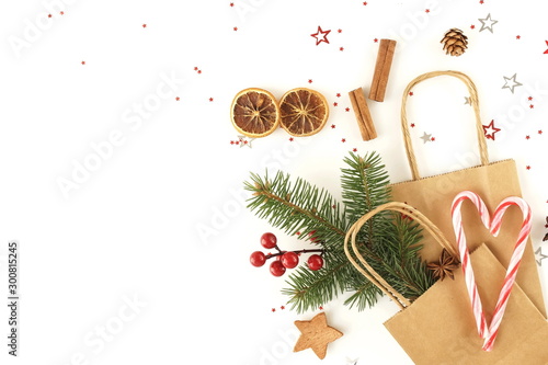 Christmas background with fir twigs, gift box,  shopping bags, Xmas or new ye...